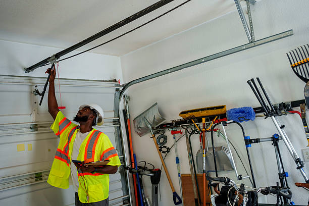 Professional Garage Door Panel Replacement technician working in Clayton, IN